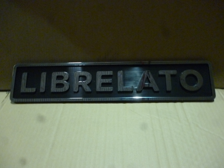 Insignia librelato trasera (plastico) - Imagen principal